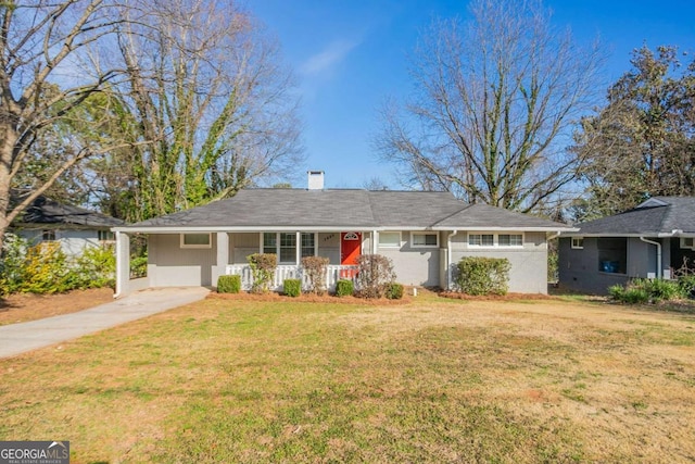 single story home featuring a chimney, driveway, covered porch, and a front lawn