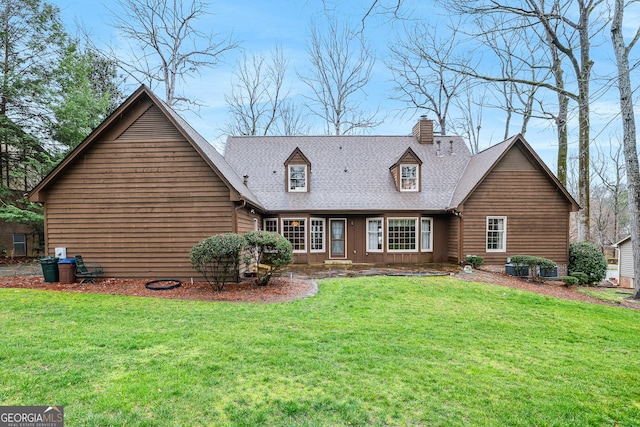 back of house with a chimney, board and batten siding, a shingled roof, and a yard