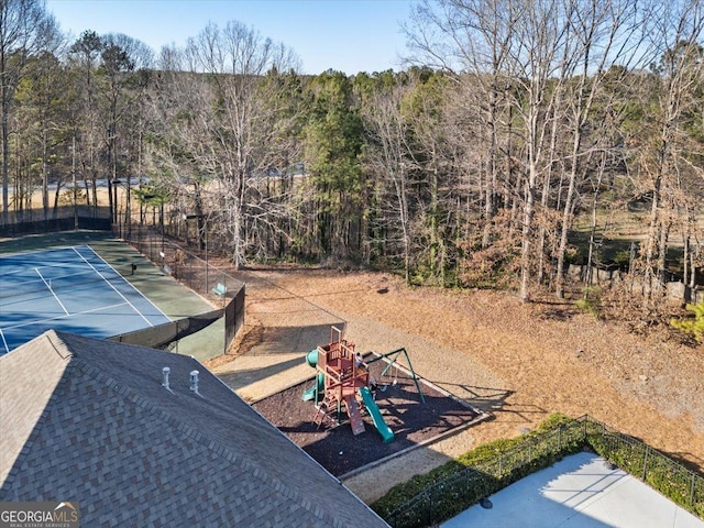 aerial view with a wooded view