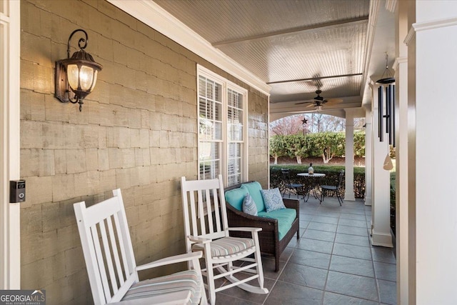 view of patio featuring a porch and ceiling fan