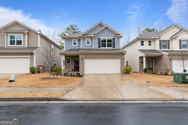 view of front of property featuring central air condition unit, driveway, brick siding, and an attached garage