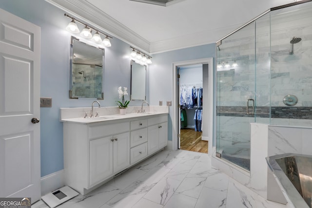 bathroom featuring crown molding, double vanity, a stall shower, marble finish floor, and a sink