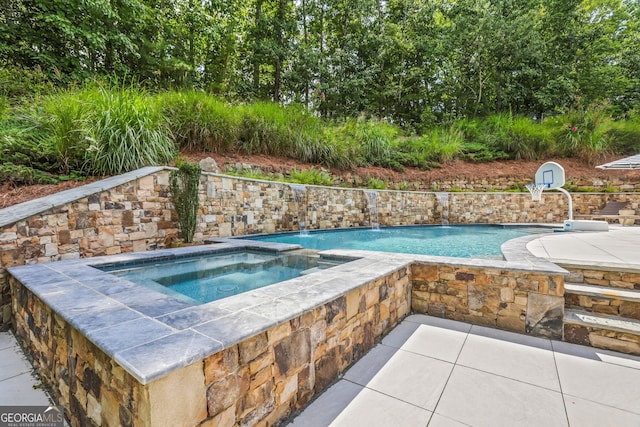 outdoor pool with an in ground hot tub