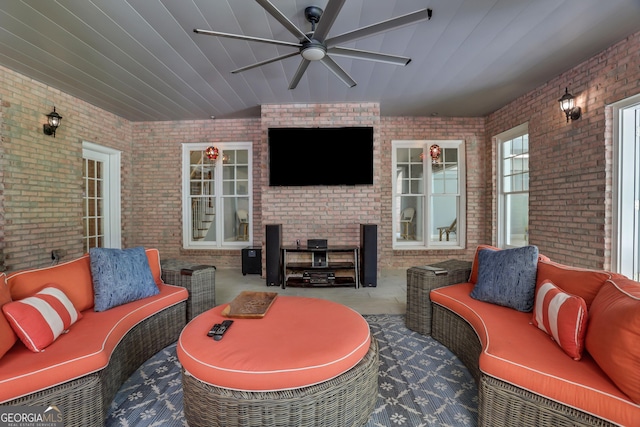 view of patio / terrace with an outdoor living space and a ceiling fan