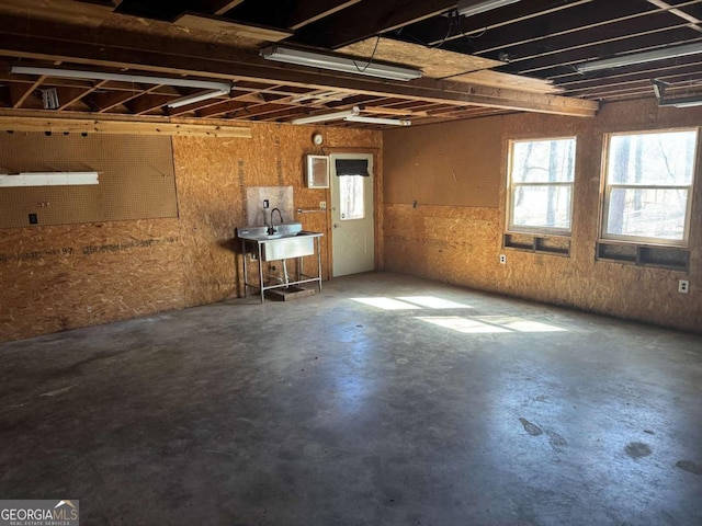 basement featuring a sink