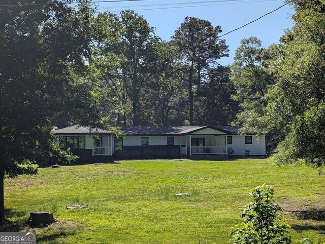 exterior space with a front lawn