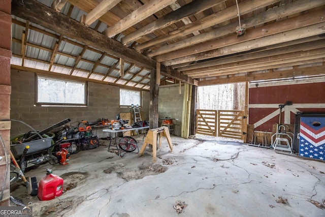 garage featuring concrete block wall