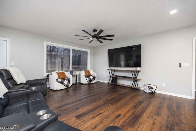 living area featuring recessed lighting, ceiling fan, baseboards, a textured ceiling, and wood finished floors