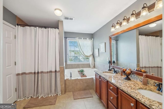 full bathroom with a bath, tile patterned flooring, visible vents, and a sink