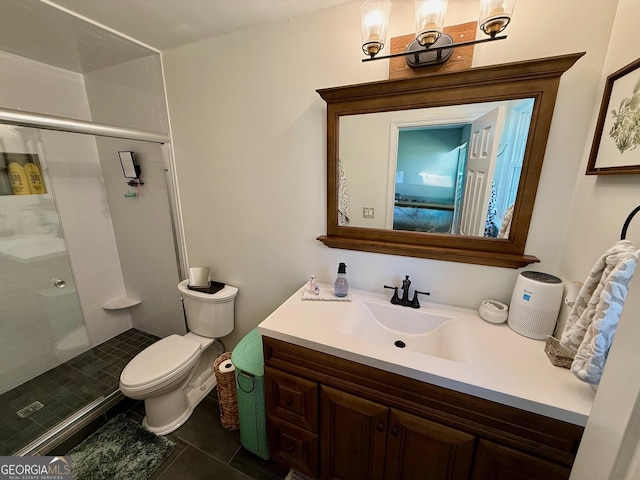 full bathroom with tile patterned floors, a shower stall, toilet, and vanity