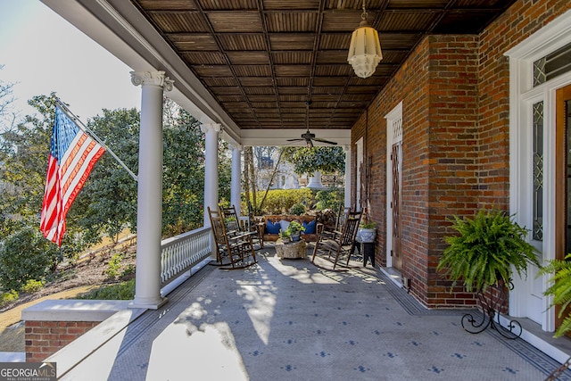 view of patio with a porch and a ceiling fan