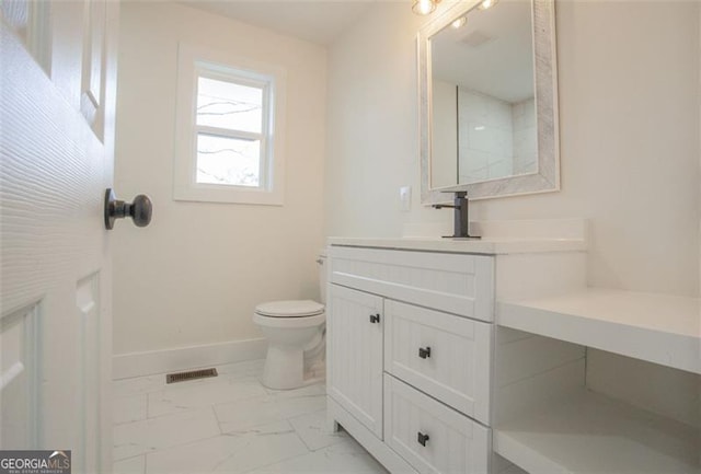 full bath featuring visible vents, baseboards, toilet, marble finish floor, and vanity