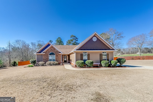 view of front of house with fence