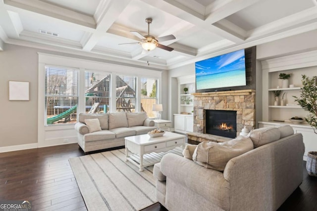 living room featuring dark wood-type flooring, built in features, baseboards, and coffered ceiling