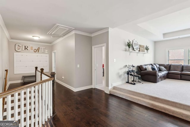 corridor featuring an upstairs landing, dark wood finished floors, baseboards, and ornamental molding