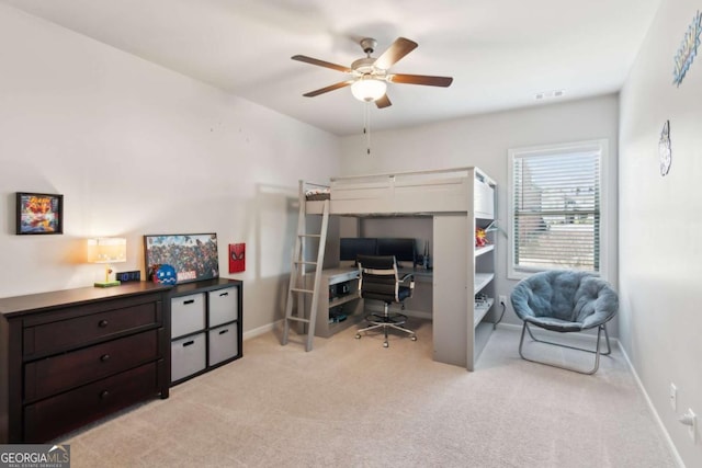 bedroom with light carpet, visible vents, a ceiling fan, and baseboards