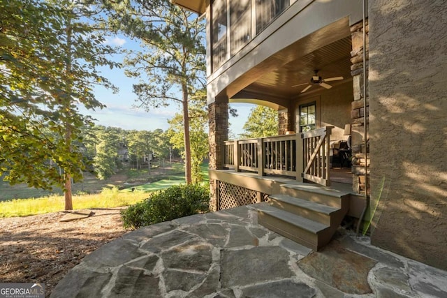 view of patio featuring a ceiling fan