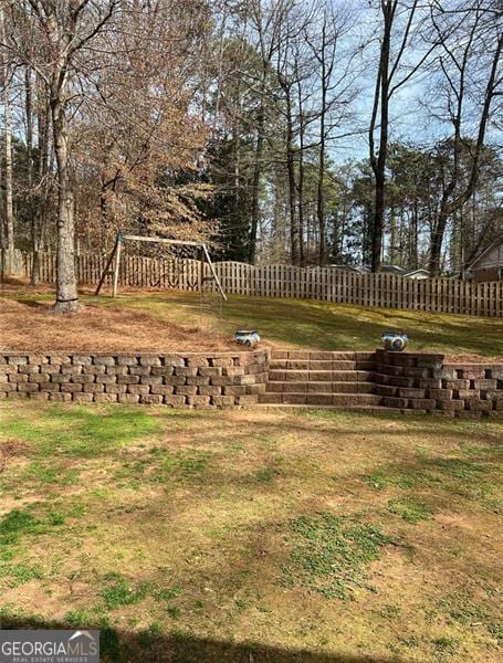 view of yard with fence