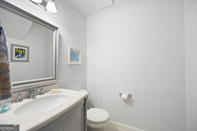 half bath with baseboards, toilet, ornamental molding, and vanity