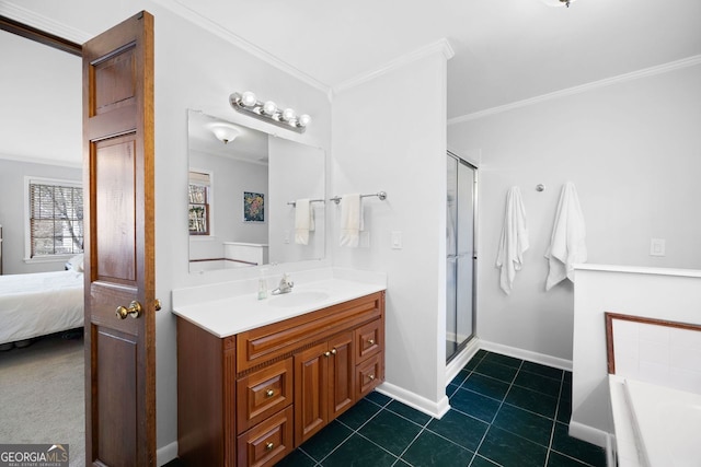 ensuite bathroom with tile patterned floors, a shower stall, crown molding, baseboards, and vanity