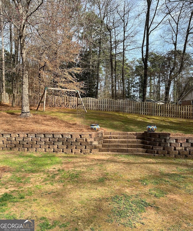 view of yard featuring fence