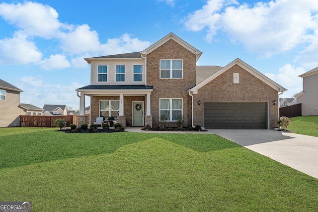 view of front facade with a front lawn, driveway, an attached garage, fence, and brick siding