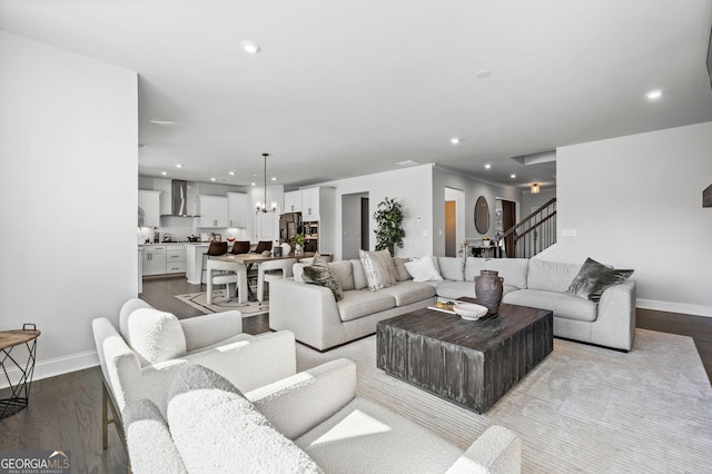 living area with stairway, recessed lighting, dark wood-style flooring, and baseboards