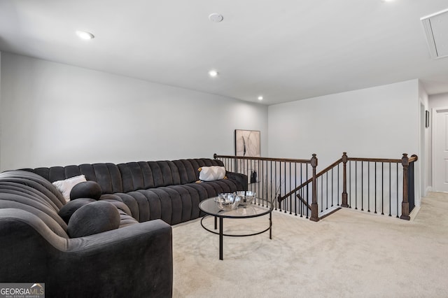 living area with attic access, carpet floors, and recessed lighting