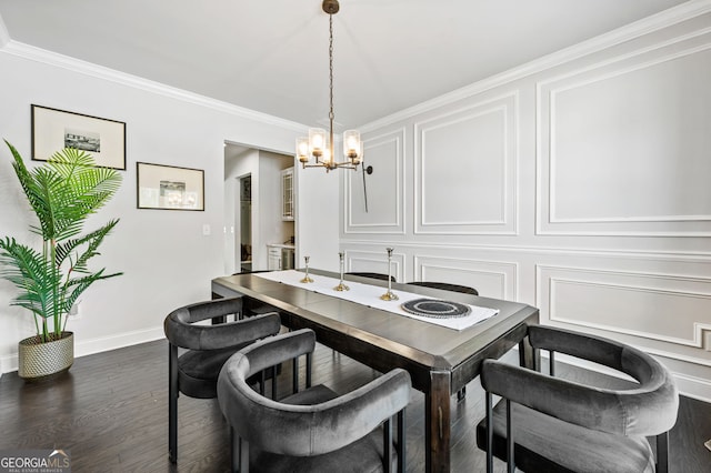 dining space with crown molding, a decorative wall, a notable chandelier, and dark wood-type flooring