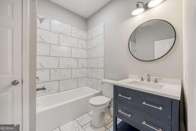 bathroom featuring bathing tub / shower combination, toilet, marble finish floor, and vanity