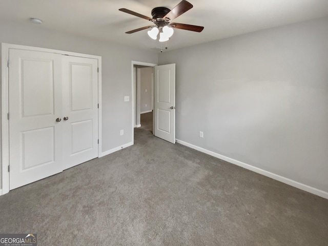 unfurnished bedroom featuring a closet, carpet flooring, ceiling fan, and baseboards