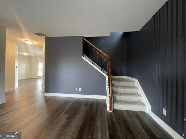 5928 Cobblestone Creek Cir, Mableton, GA 30126 - stairs featuring wood finished floors, baseboards, and visible vents