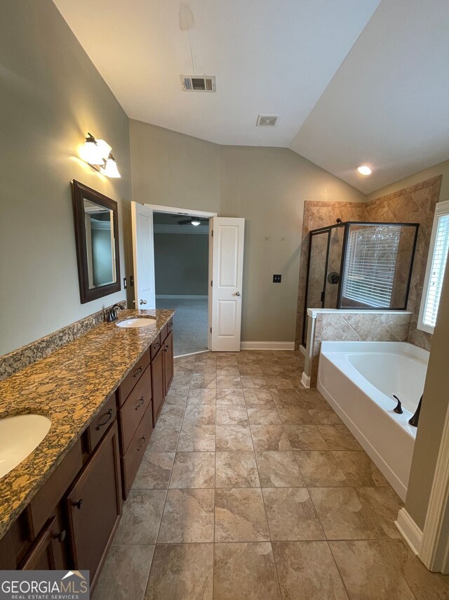 5928 Cobblestone Creek Cir, Mableton, GA 30126 - bathroom with a shower stall, a garden tub, double vanity, and visible vents