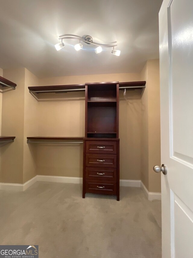 5928 Cobblestone Creek Cir, Mableton, GA 30126 - walk in closet featuring light colored carpet