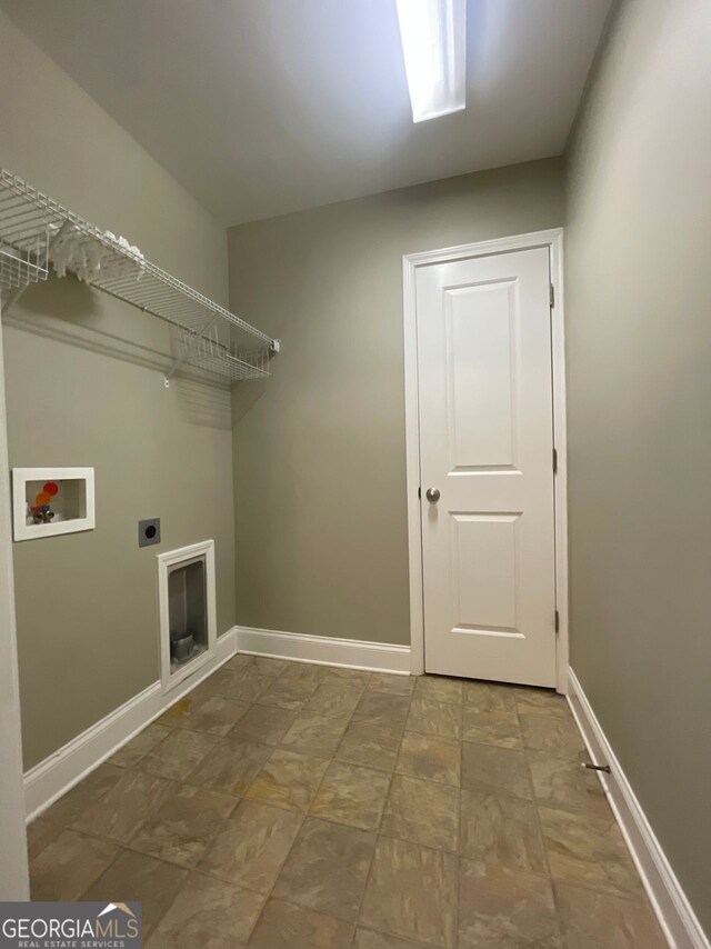 5928 Cobblestone Creek Cir, Mableton, GA 30126 - laundry area with baseboards, electric dryer hookup, hookup for a washing machine, and laundry area
