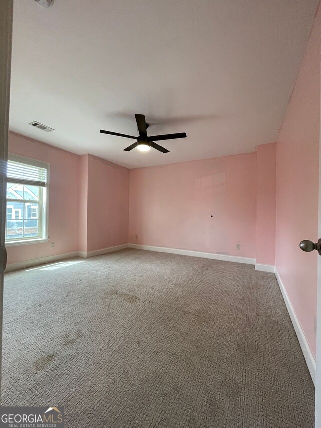 5928 Cobblestone Creek Cir, Mableton, GA 30126 - carpeted empty room featuring visible vents, baseboards, and ceiling fan