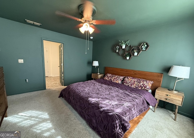 carpeted bedroom featuring ceiling fan