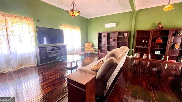 living area with hardwood / wood-style floors, a wall mounted air conditioner, and ornamental molding