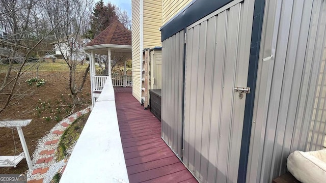 view of home's exterior with roof with shingles