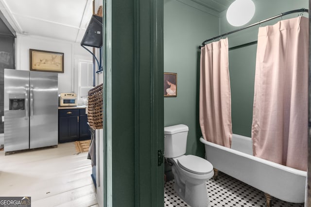 bathroom featuring toilet and shower / bathtub combination with curtain