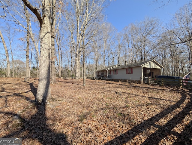 view of yard with fence