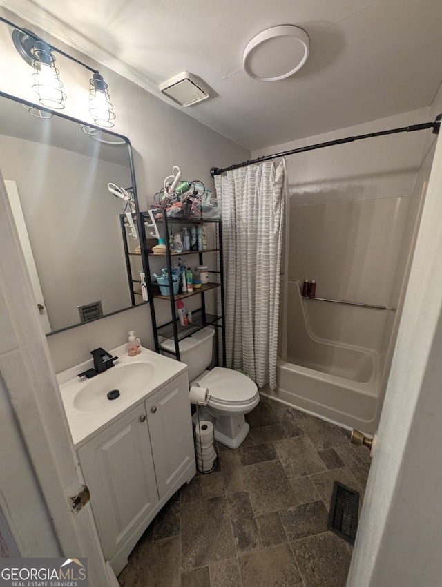 bathroom with visible vents, stone finish flooring, toilet, shower / bath combination with curtain, and vanity