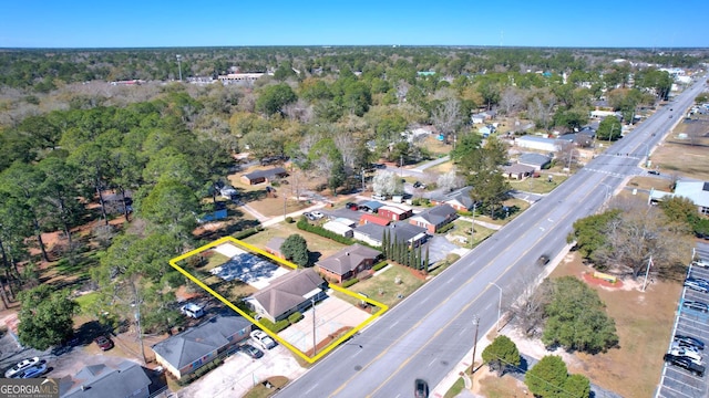 aerial view with a residential view and a forest view