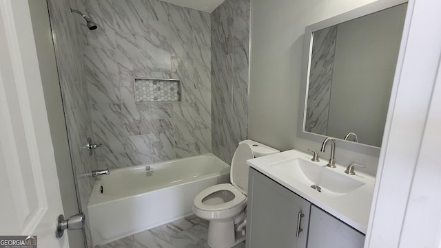 bathroom featuring vanity, toilet, tub / shower combination, and marble finish floor