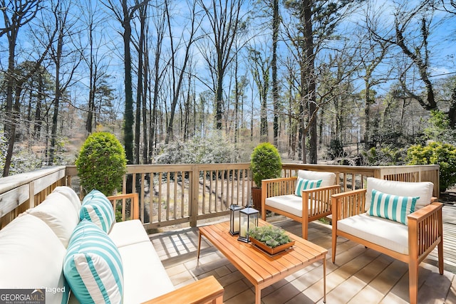 wooden deck with outdoor lounge area