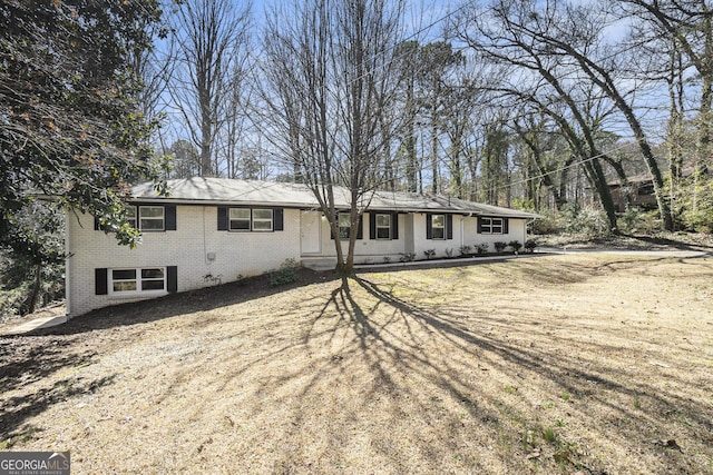 ranch-style home with brick siding