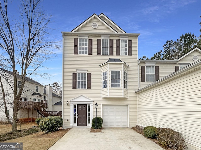 view of front facade with an attached garage and driveway