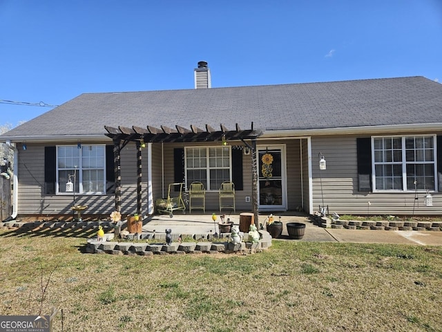 single story home featuring a shingled roof, a front lawn, a chimney, a pergola, and a patio