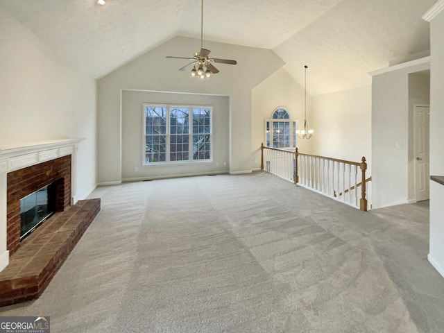 unfurnished living room featuring high vaulted ceiling, baseboards, carpet, and a fireplace