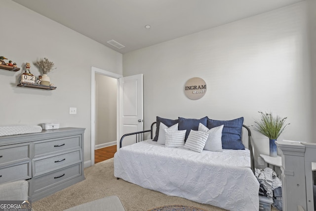 bedroom featuring visible vents